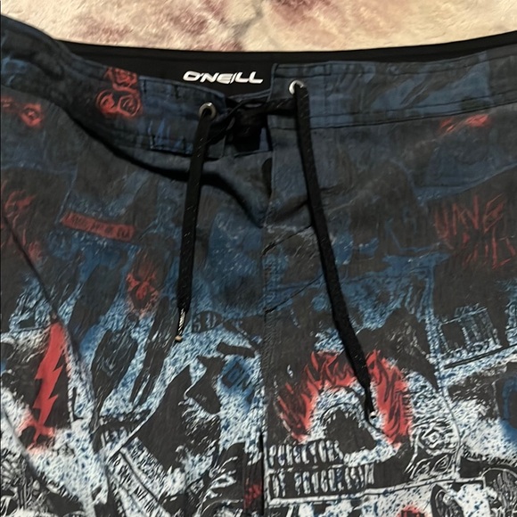 O'Neill Black and Red Board Shorts with Dynamic Design - Picture 4 of 6